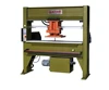 Travelling head die cutting machine for fabric leather