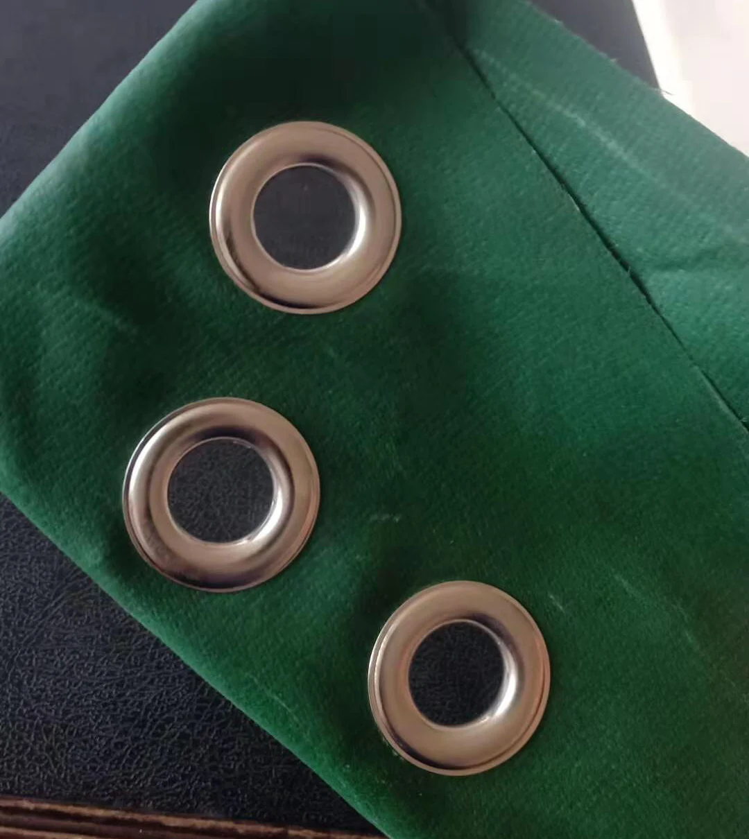 eyelet machine for tarp.JPG