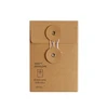 Custom made kraft envelope with button and string closure