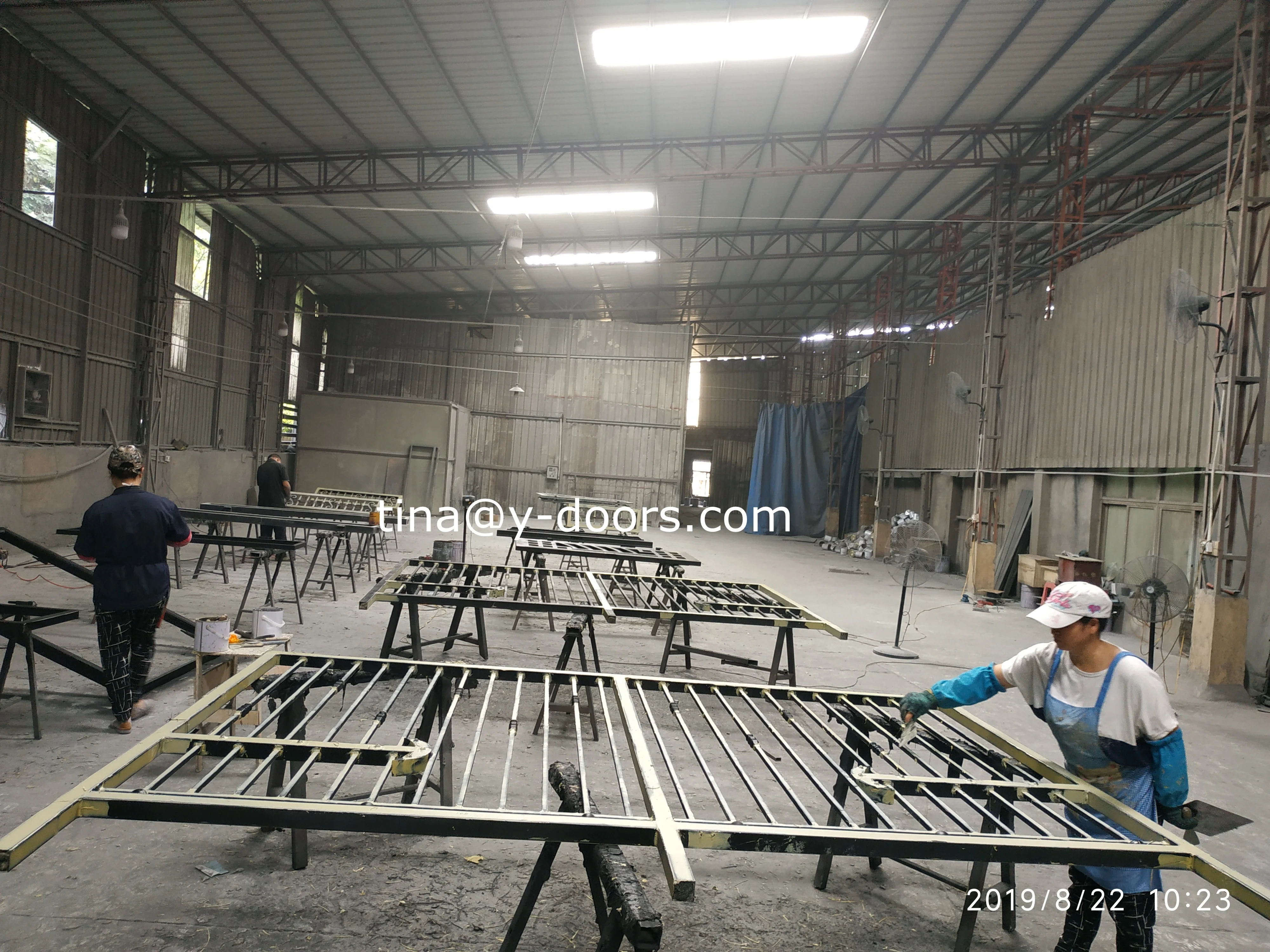 iron driveway gate in our workshop.jpg