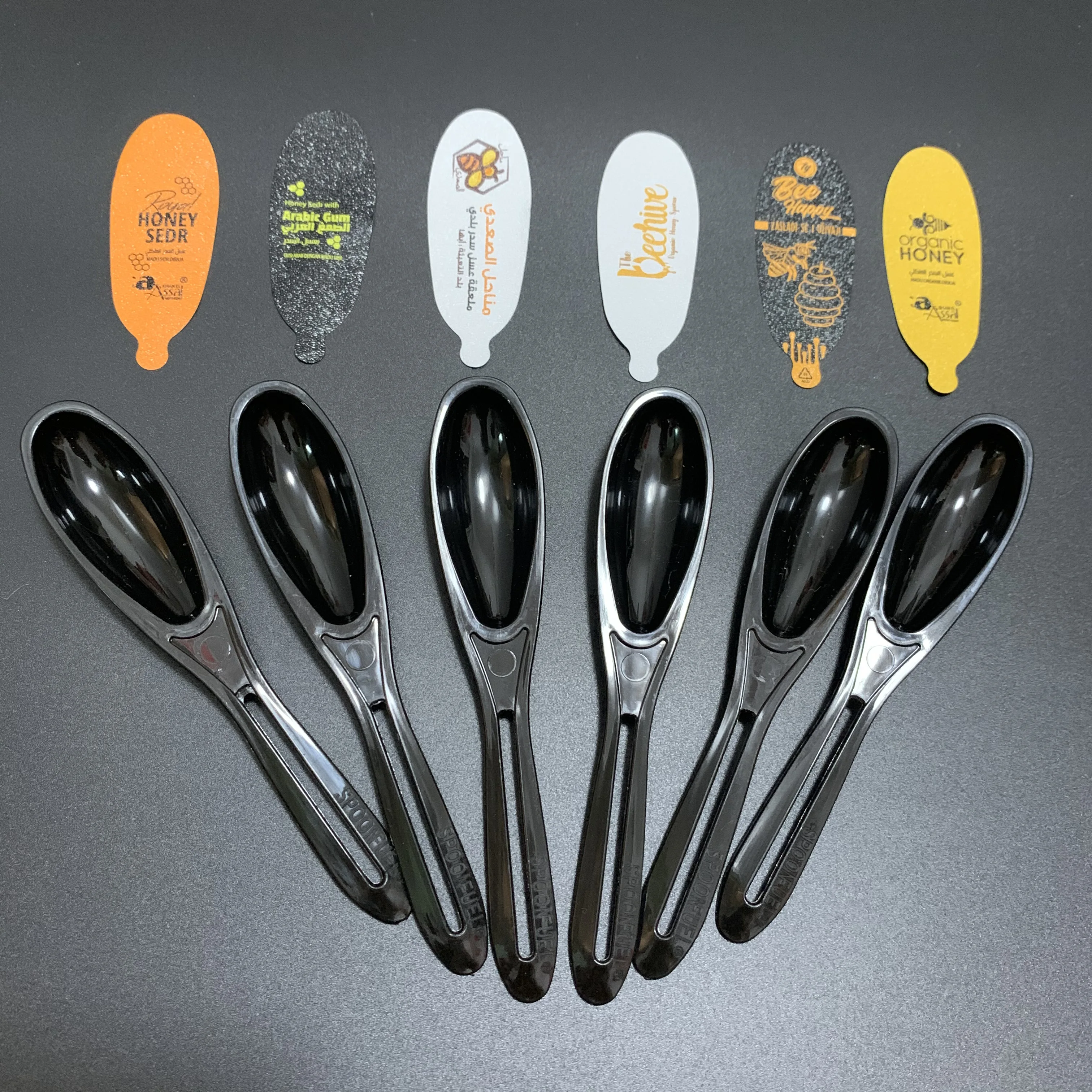 Hot selling 7g disposable foil seal wrapped plastic honey spoon wholesale