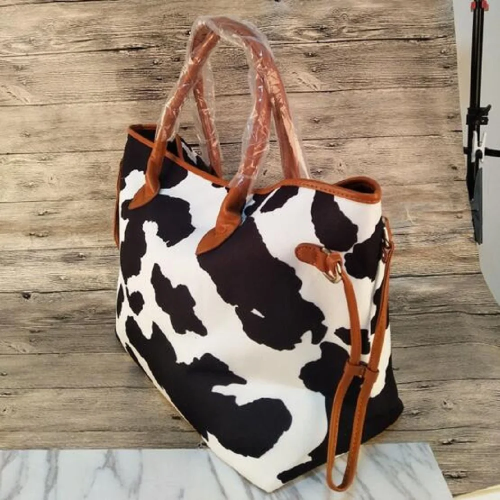 steve madden cow print purse