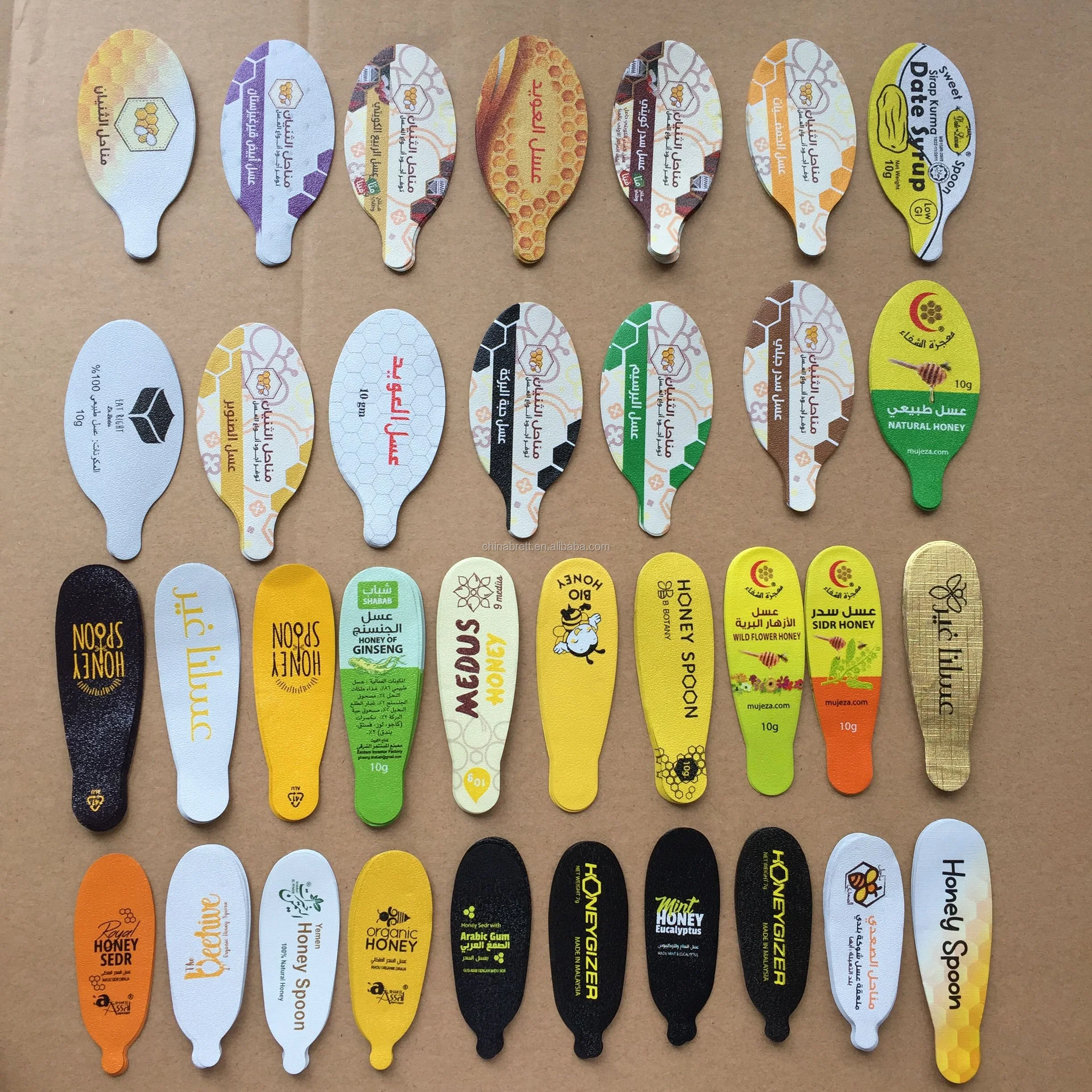 Hot selling 7g disposable foil seal wrapped plastic honey spoon wholesale