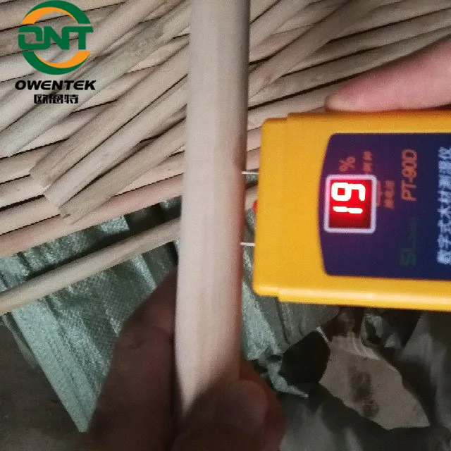 machine making wood broom handle