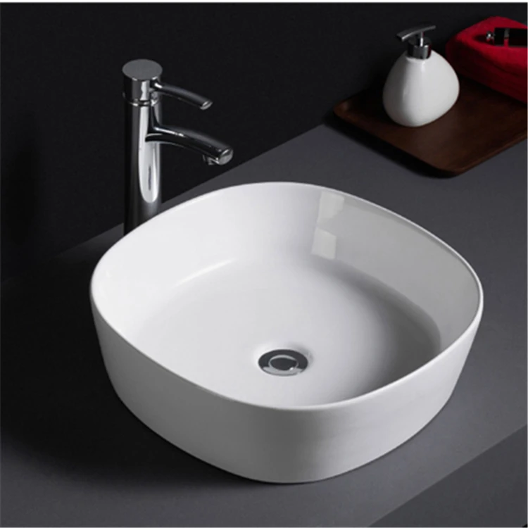 506 Wholesale white glaze cheap prices free standing porcelain bathroom basin for hotel