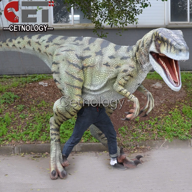 green dinosaur suit raptor