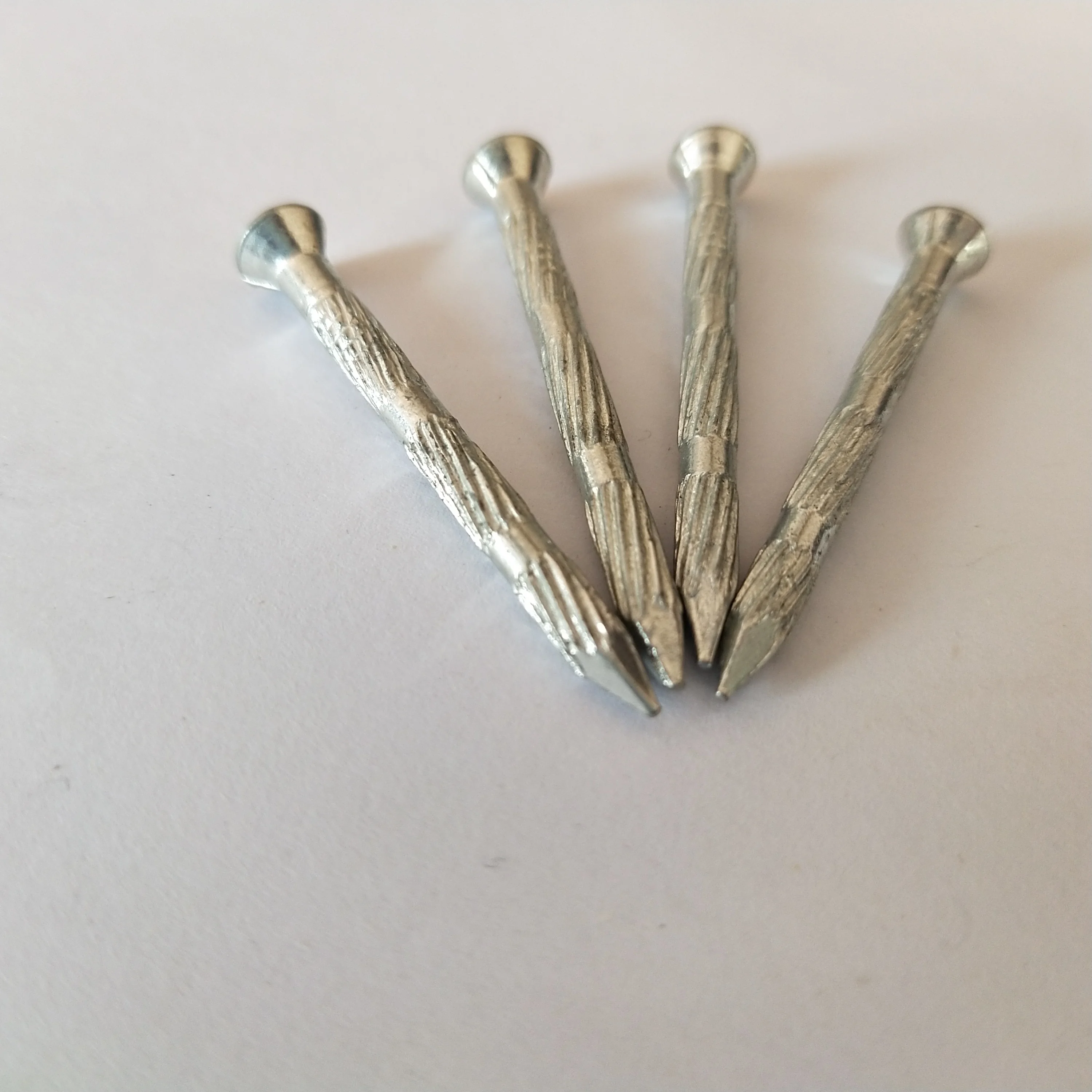 1" - Fluted Hardened Concrete Masonry Nails - High Strength Cut