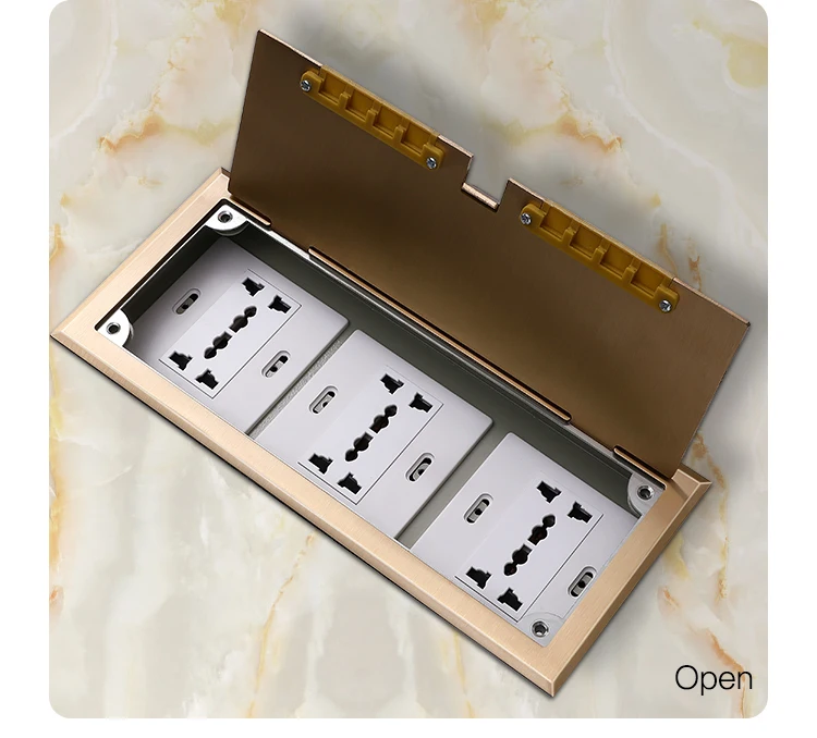 Three commercially customizable brass open floor socket boxes