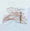 Popular metal wire rose gold laundry clothes hanger stand for clothes and hanger coat hook dry cleaning