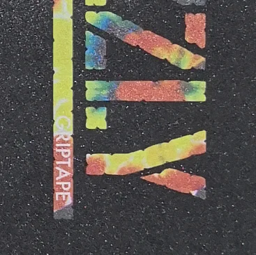 Skateboard grip tape