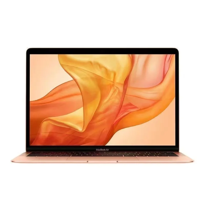 2020 M1 MacBook Air in silver finish on white desk with notebook and coffee cup