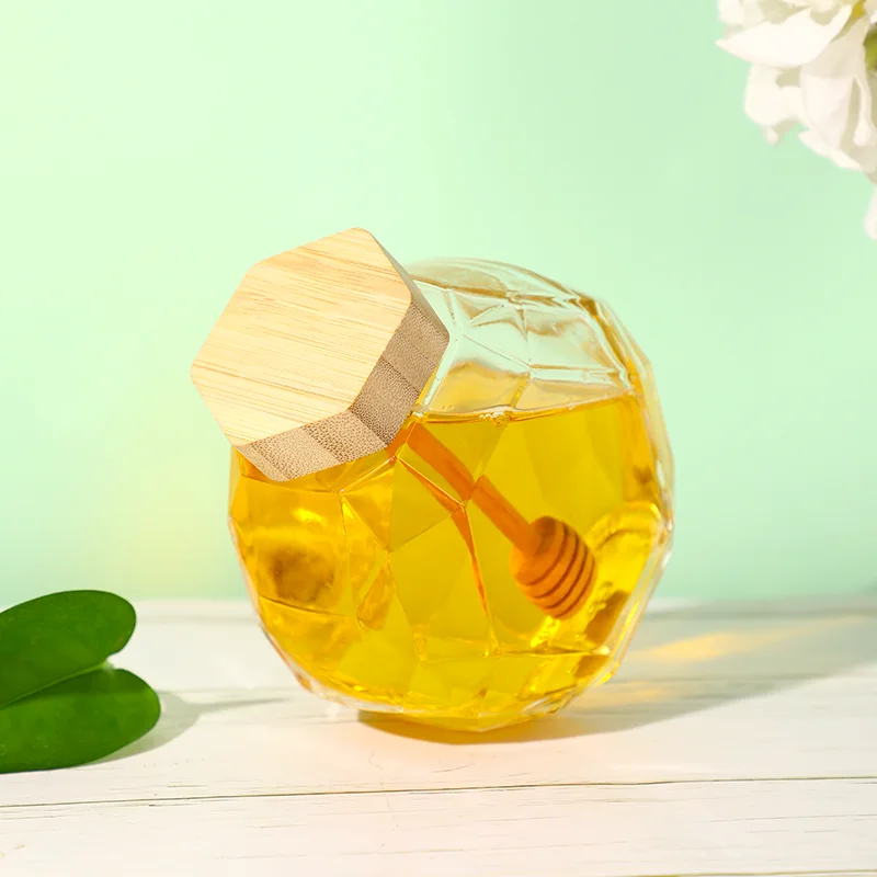 Factory Direct sales Glass Hexagon Honey Bottles Jar With Wooden Dipper And Lid supplier