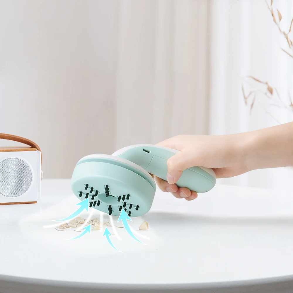 
Mini wet and dry dual-use car keyboard smart USB rechargeable portable handheld electric desk sofa small vacuum cleaner 