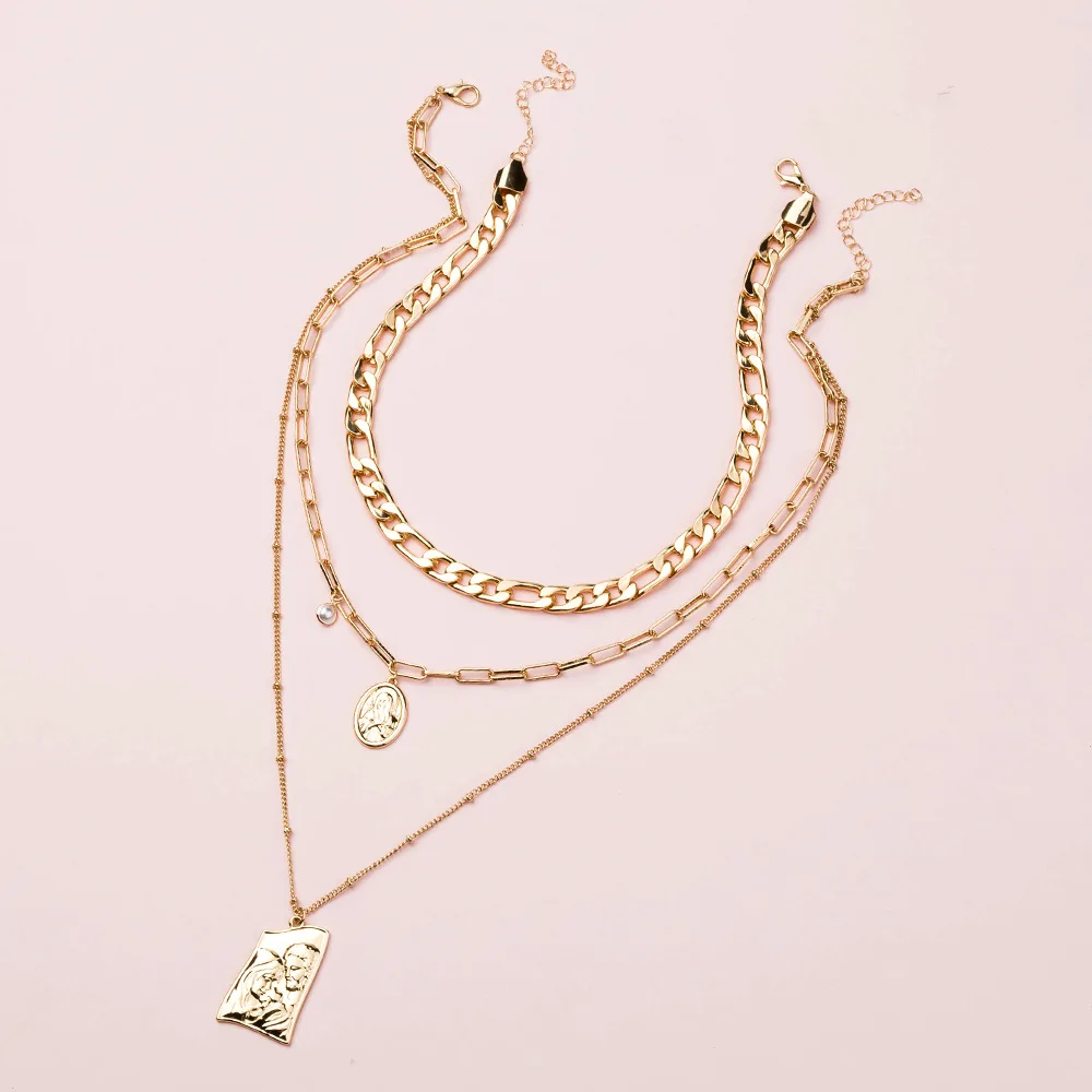 批发吊坠项链锌合金饰品人类图案压花毛衣链