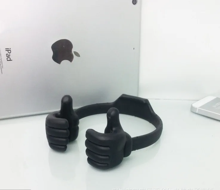 Portable thumbs up finger mobile phone stand