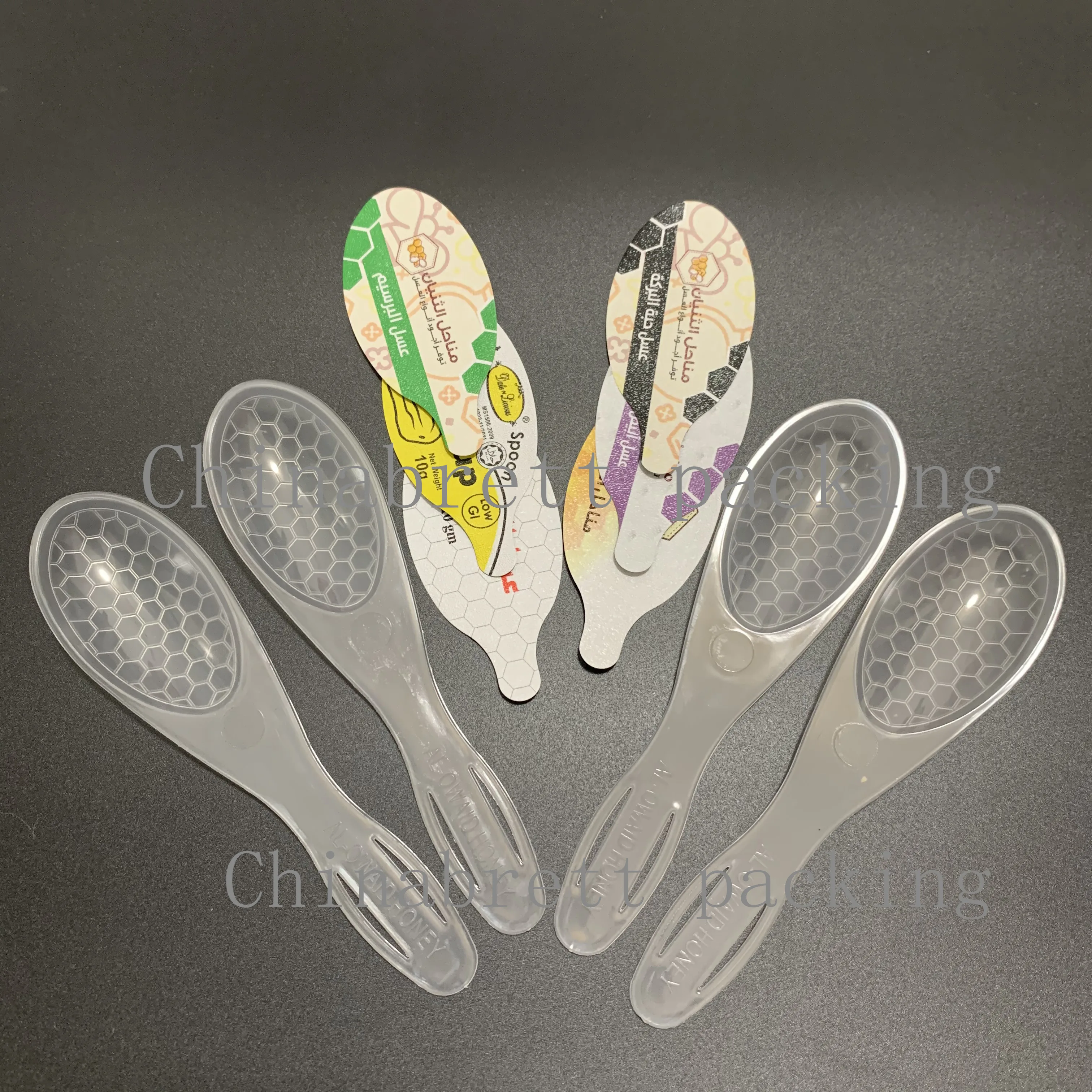 Hot selling 7g disposable foil seal wrapped plastic honey spoon wholesale