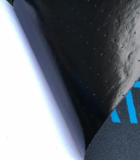 Skateboard grip tape