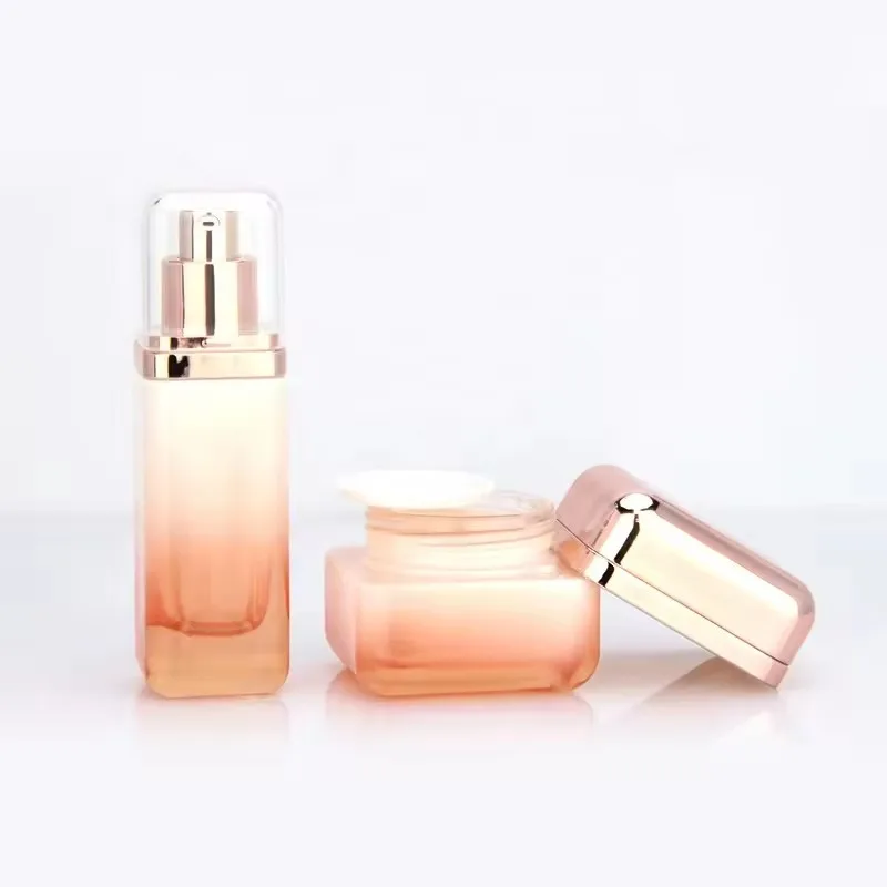 Supplier Cosmetic square glass bottle set Innovative design of rose gold cover for skincare packaging 50g40ml100ml120ml details