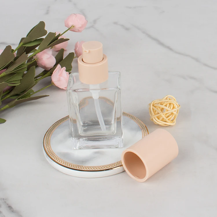 Cosmetic 30ml empty makeup foundation glass bottles skincare packaging container with pump spray cap factory