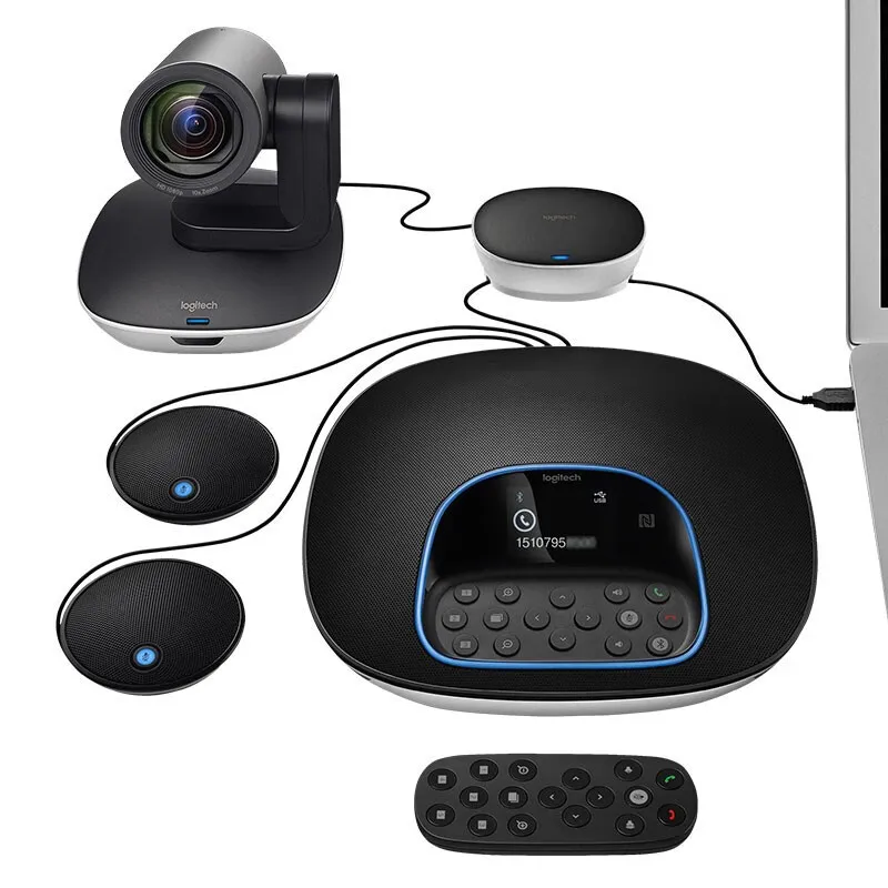 Side-by-side comparison of laptop built-in camera vs external 1080p computer camera in low-light office setting