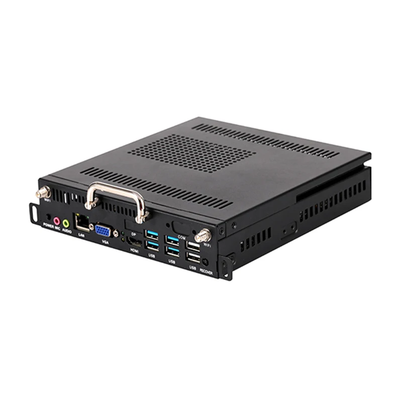 Beelink MINI S12 Pro desktop mini PC mounted behind a flat-panel monitor in a classroom setting