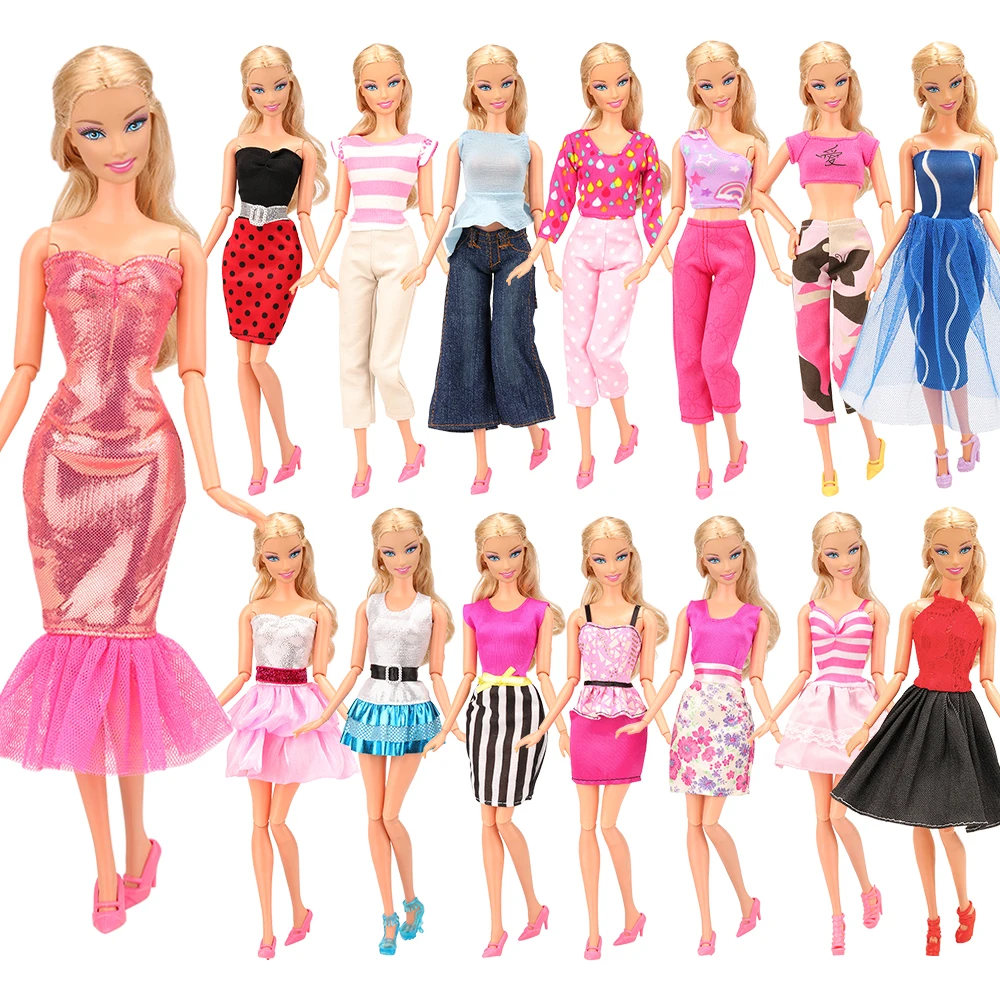 barbie doll with dresses and shoes