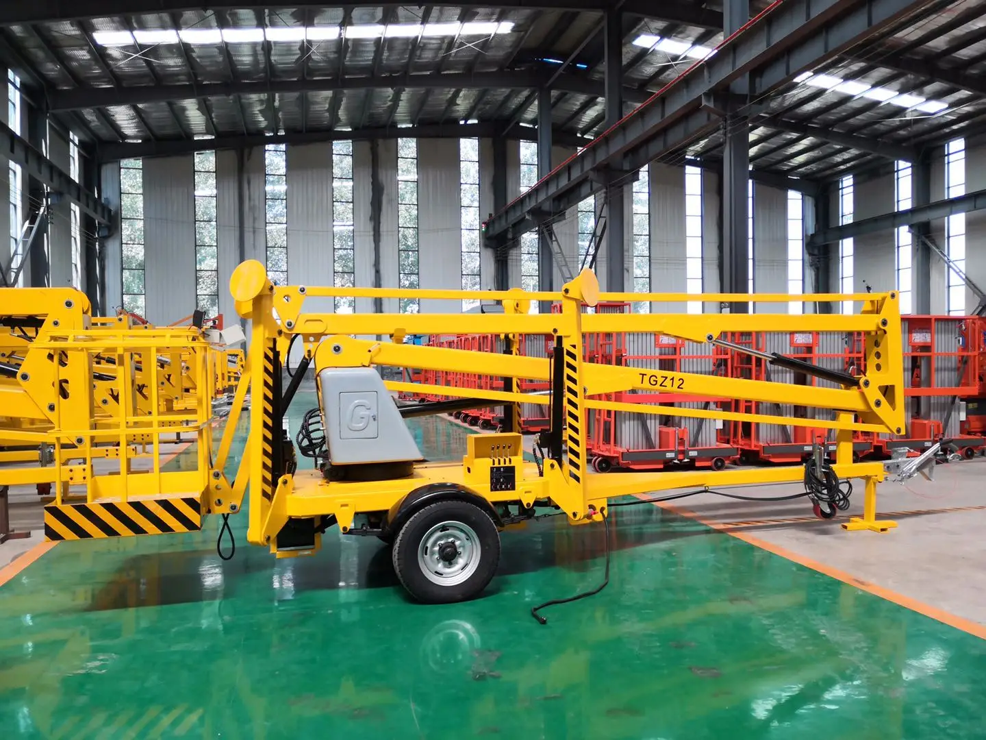 China Cherry Picker Spider Lift Man Boom Lift Aerial Work Platform Trailer Mounted Articulating 3957