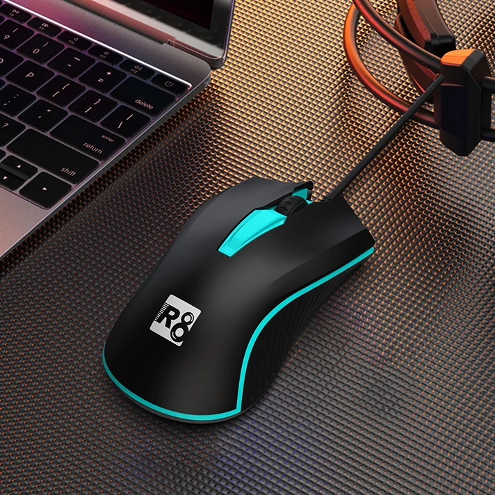 Bloody SG5 SE-S-Tour Grip No.5 gaming mouse showing textured grip surface and compact form factor
