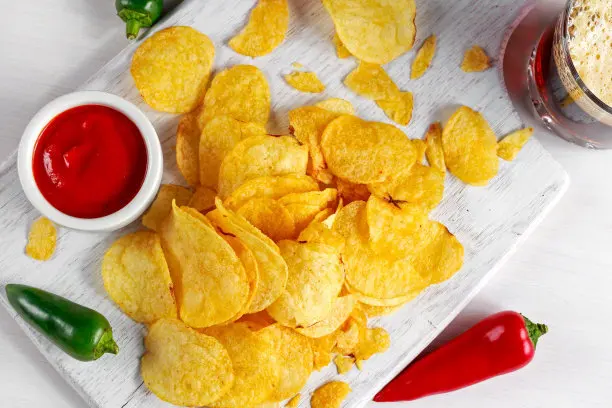 crispy snacks, tomato flavored potato chips