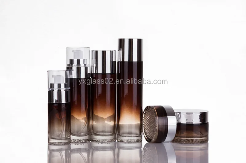 Luxury Cosmetic glass bottle set -- skincare container manufacturer-- new style design with pump&spray&gold/aluminum cap factory