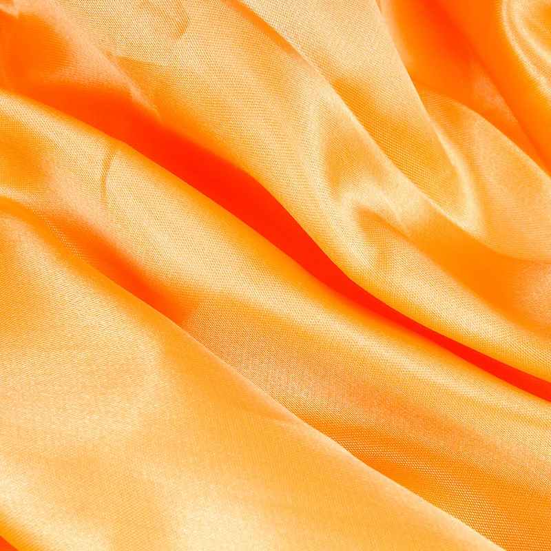 100% 涤纶亮橙色斜纹染色缎面面料美丽的婚礼装饰