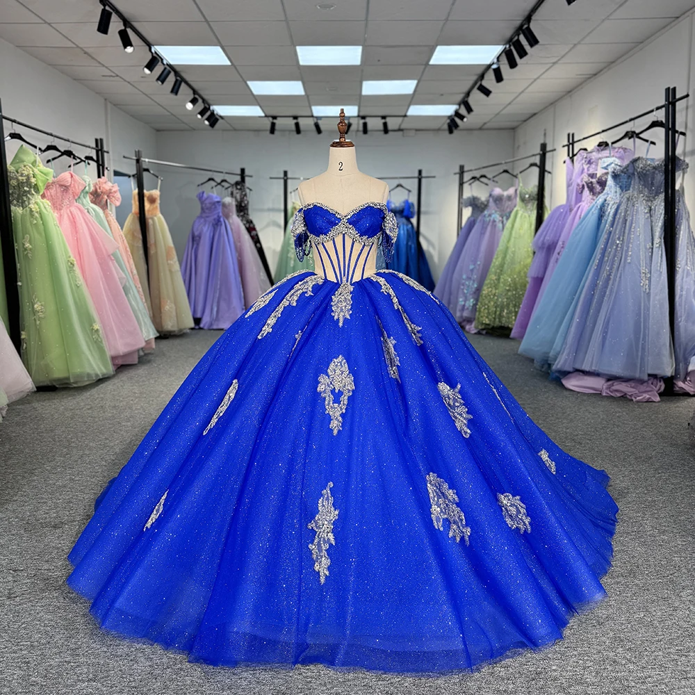 royal blue and gold quinceañera dress Dancing Queen 5000 Long Quinceanera / Medium Refined quinceanera last doll crafted in royal blue with delicate gold accents to complement your celebration style. royal blue and gold quinceañera