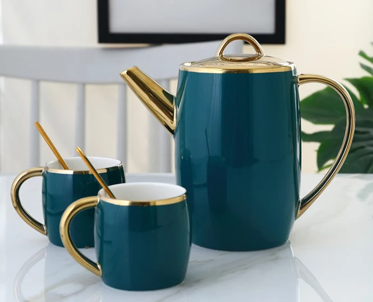 gold rim tea cup and saucer.JPG