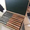 wood lathe chisel set in a wooden box
