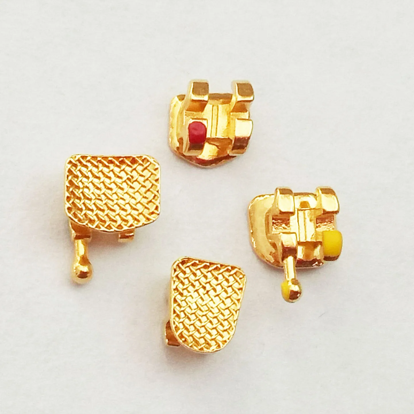 Dental Stainless Steel Orthodontic Golden Color Mesh Bracket Buy