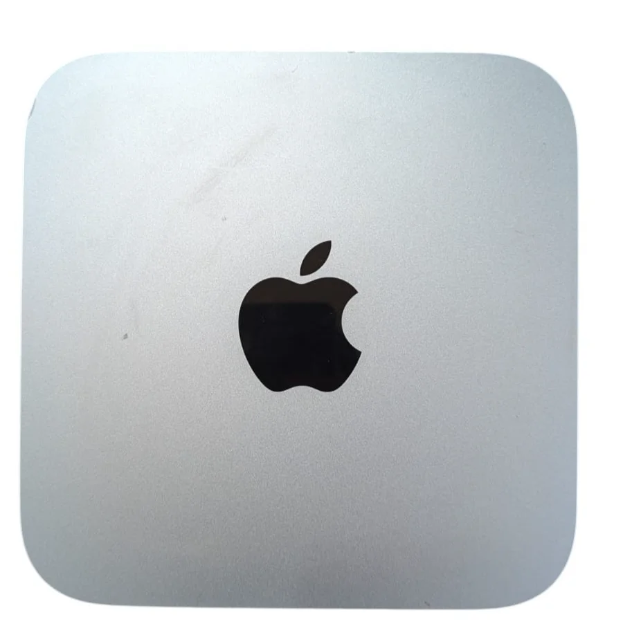 2010 Mac Mini front and rear ports showing HDMI, Mini DisplayPort, optical audio, and USB 2.0