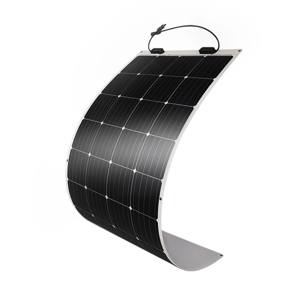 RV solar starter kit with 100W panel, MPPT controller, and mounting hardware laid out on workbench