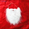 A white bushy beard dressed as Santa Claus