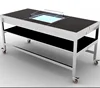 Modern cooking live station wedding party buffet serving tables