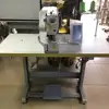 High-speed computer controlled lockstitch straight button holing sewing machine