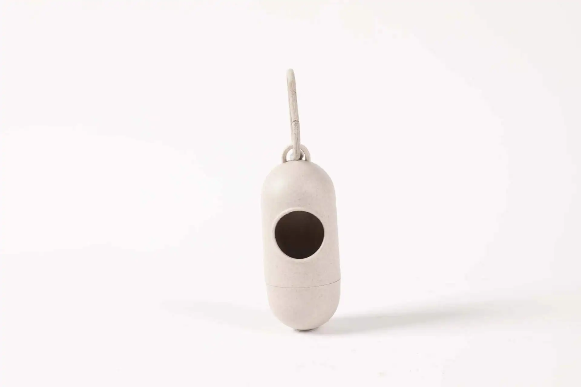 Wholesale Capsule-shaped Wheat-Straw Pet Waste Bag Holder Dog Poop Bag Dispenser