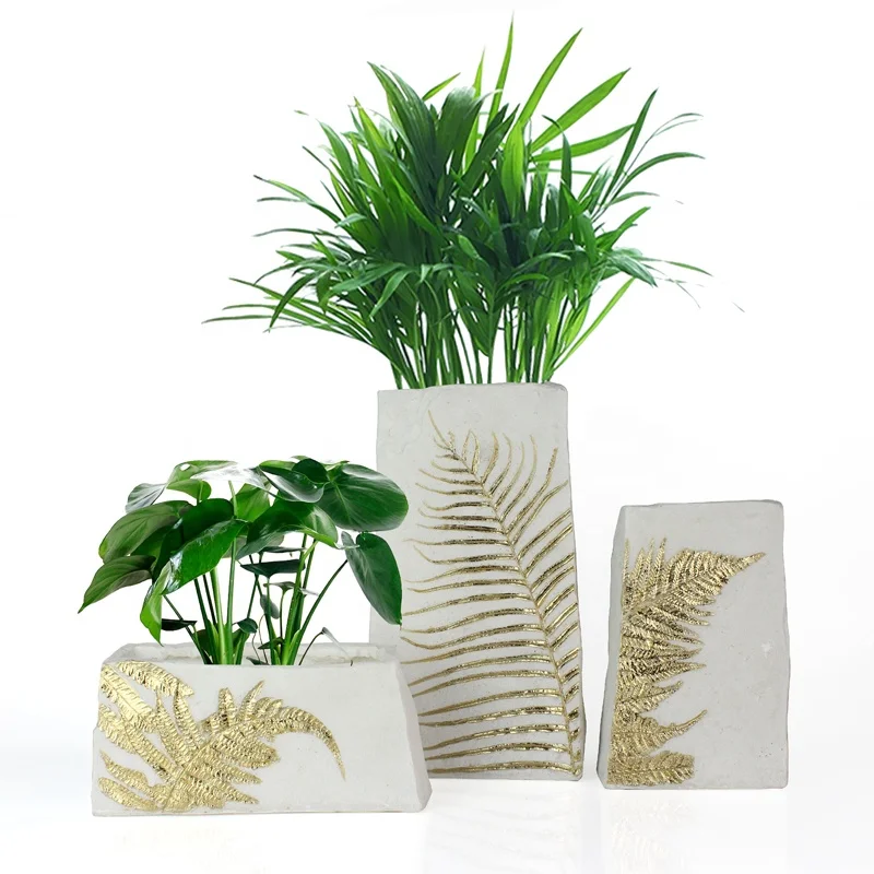 Custom Artificial Resin Quartz sand Fossil Leaves Flower Vase for Indoor Home Decor supplier