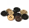 Manufacturers wholesale high-grade metal circular buttons retro black gold four eyes hand-sewn buttons