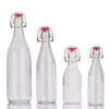 /product-detail/cheap-stocked-flip-top-cooking-oil-round-glass-bottle-swing-top-60ml-100ml-250ml-500ml-750ml-1000ml-62330877696.html