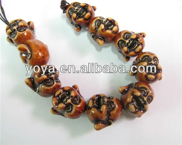 Carved turquoise buddha beads,laughing buddha head beads.jpg
