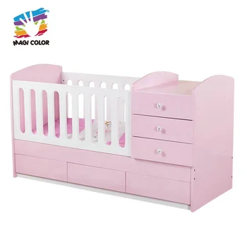 wooden crib with drawers