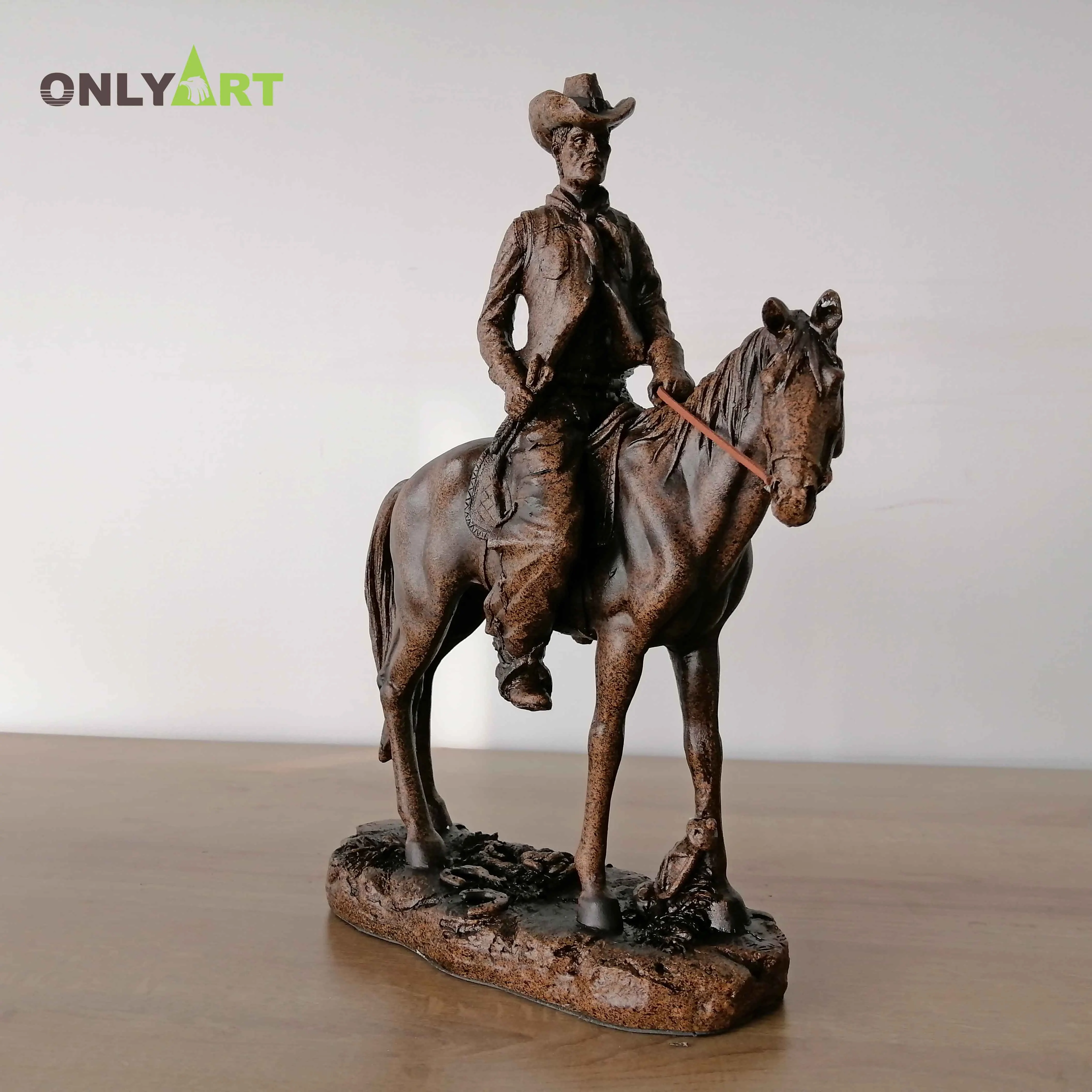 resin cowboy statues