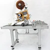 High speed automatic labeling machine with paging system for paper plastic bags