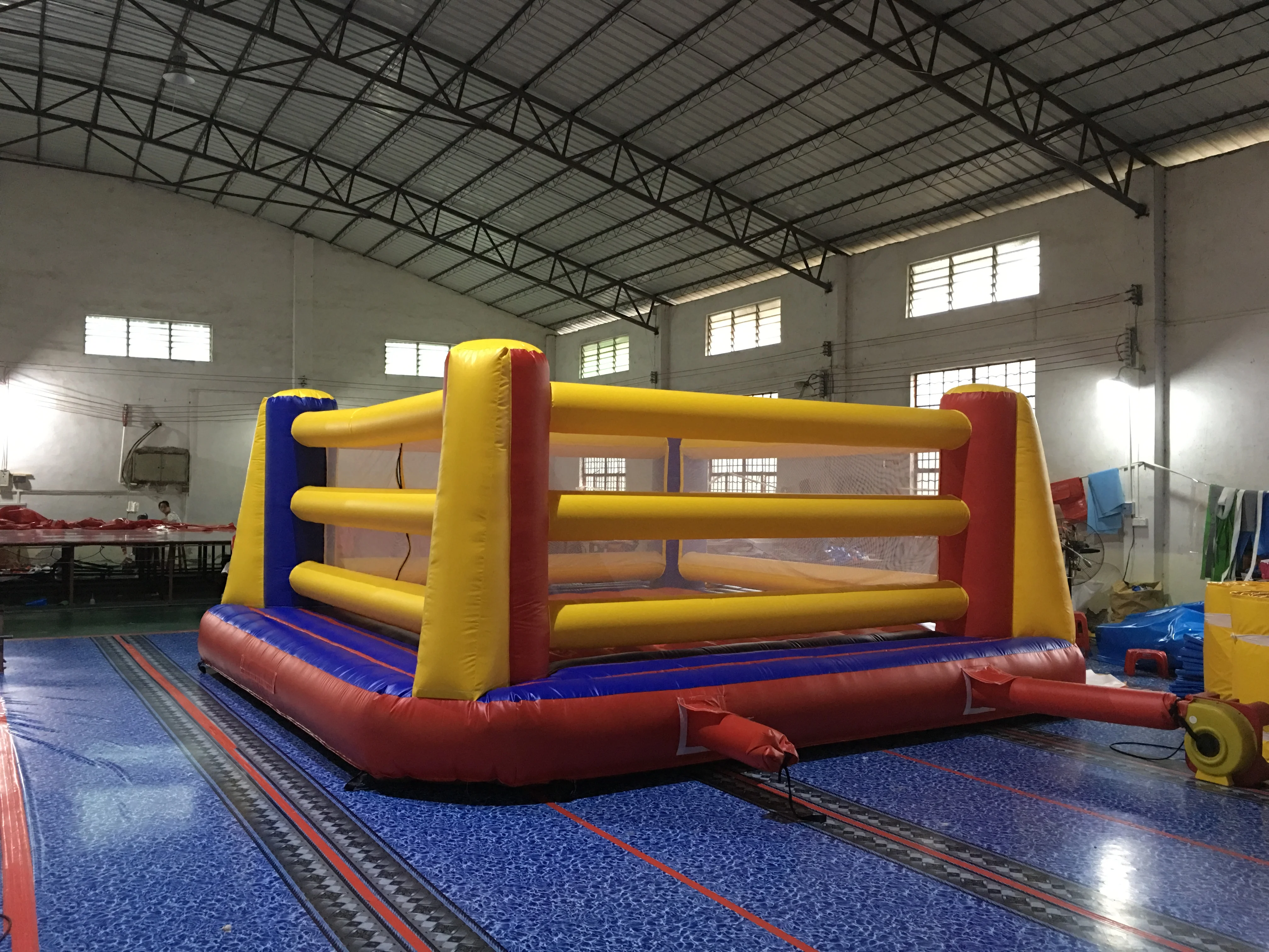 giant inflatable boxing ring arena with oversized boxing gloves
