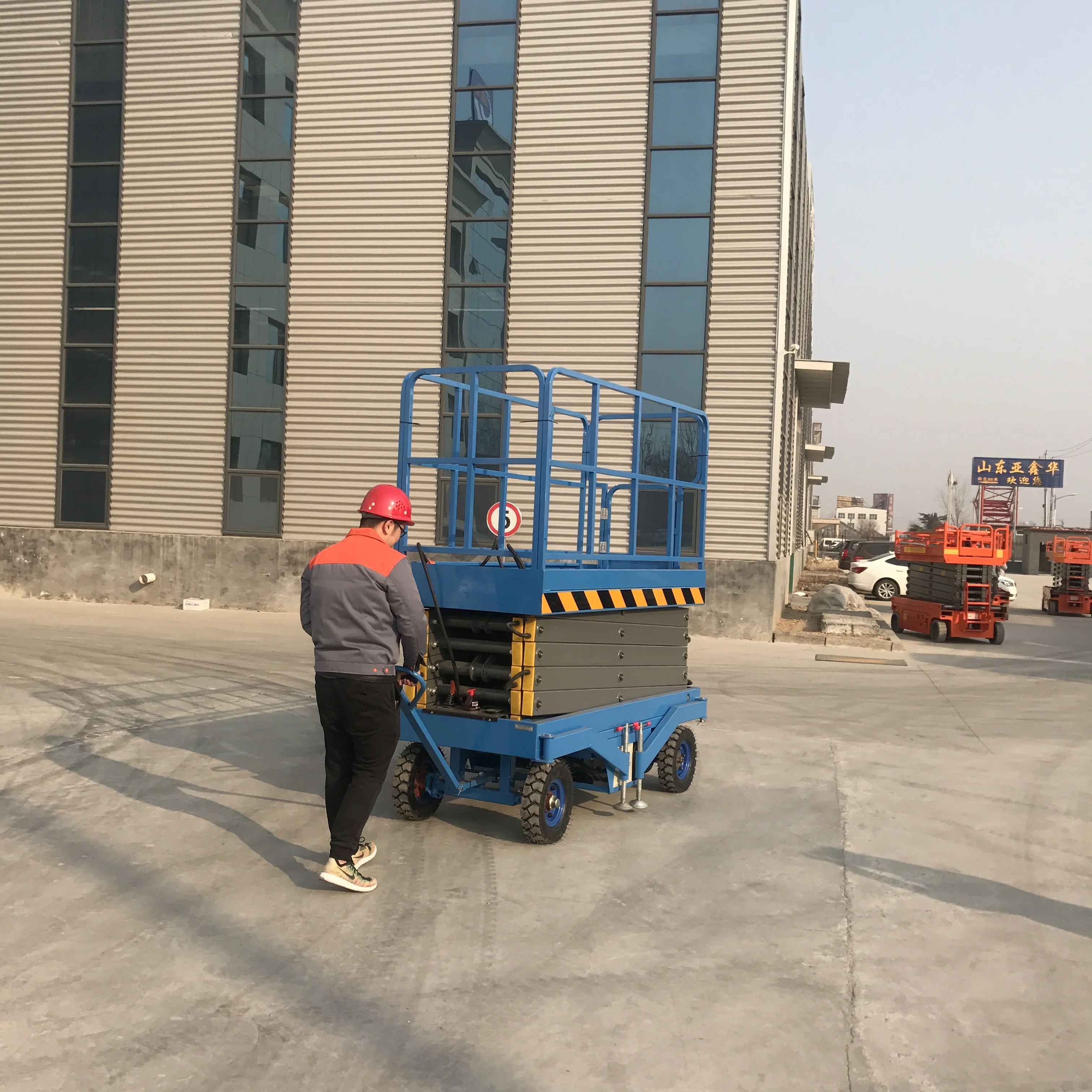 China hydraulic portable scissor lift table electric mobile lift platform manufacturer